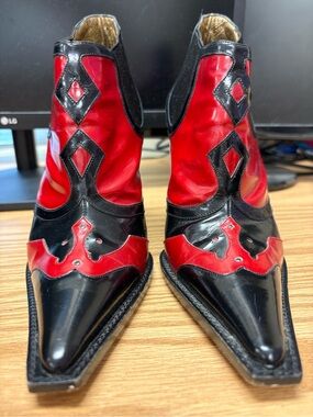 Dolce & Gabbana black and red leather stiletto ankle boots.